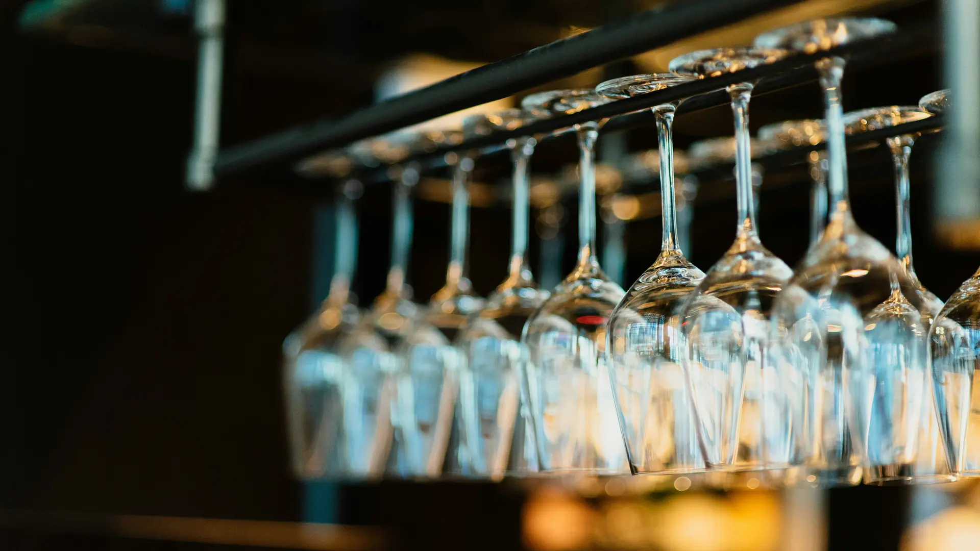 Events on the Grossglockner High Alpine Road Row of hanging wine glasses in a bar