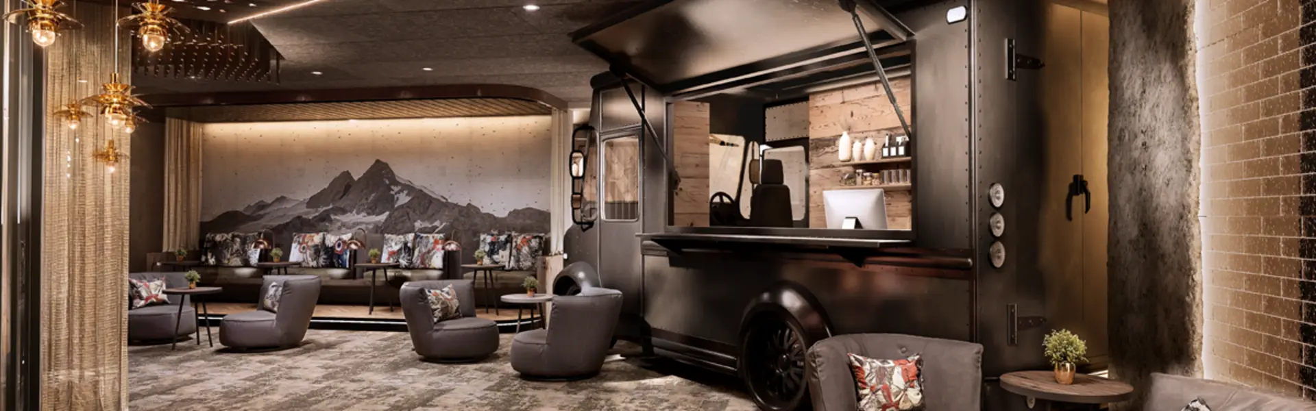 Moderne Hotellobby mit gemütlichen Sesseln und einem schwarzen Foodtruck als Bar