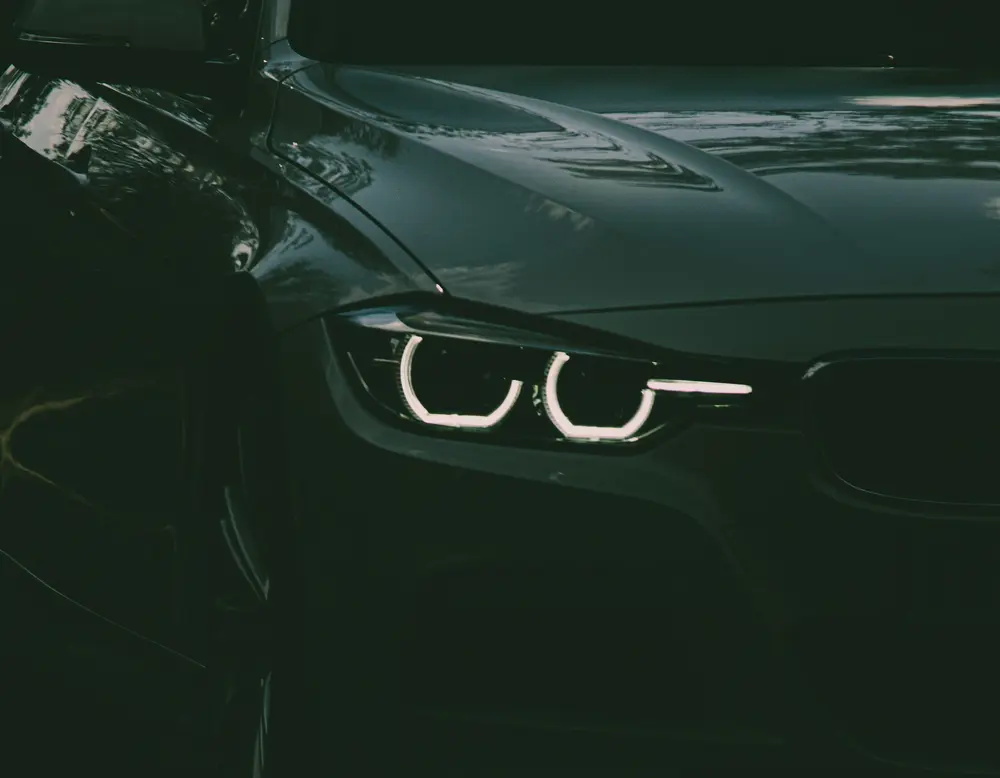 Frequently asked questions about Designer Motel glockna Dark car with headlights on at night